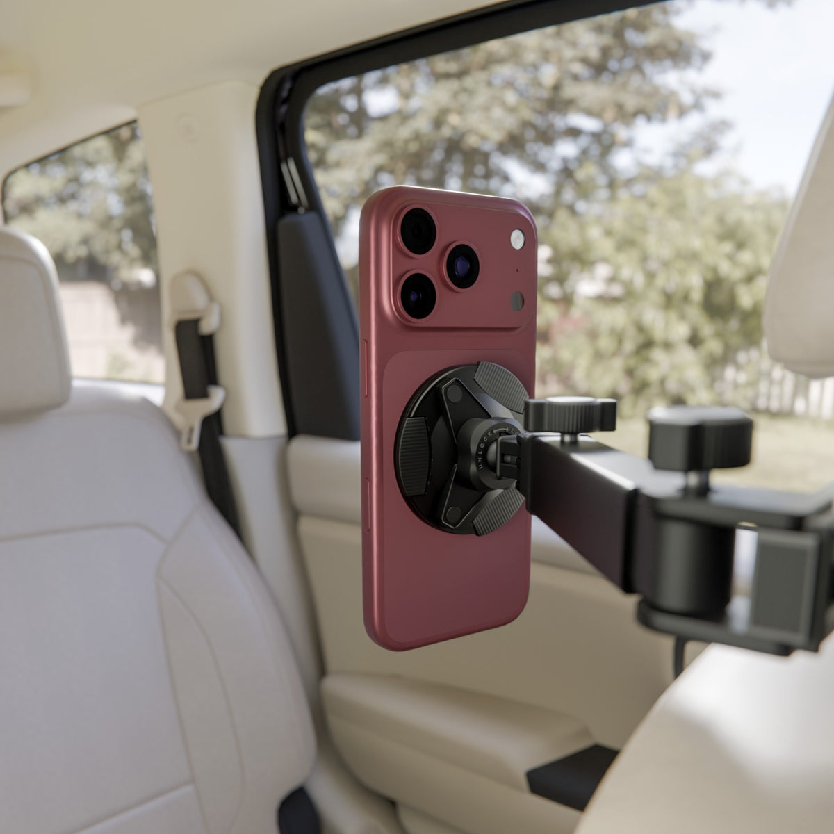 iPhone snapped onto the Back Seat Mount by MagSafe
